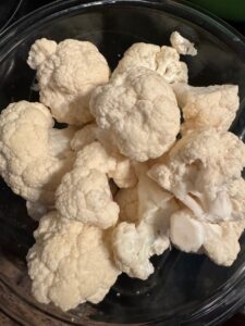 Bowl of cauliflower before cooking.