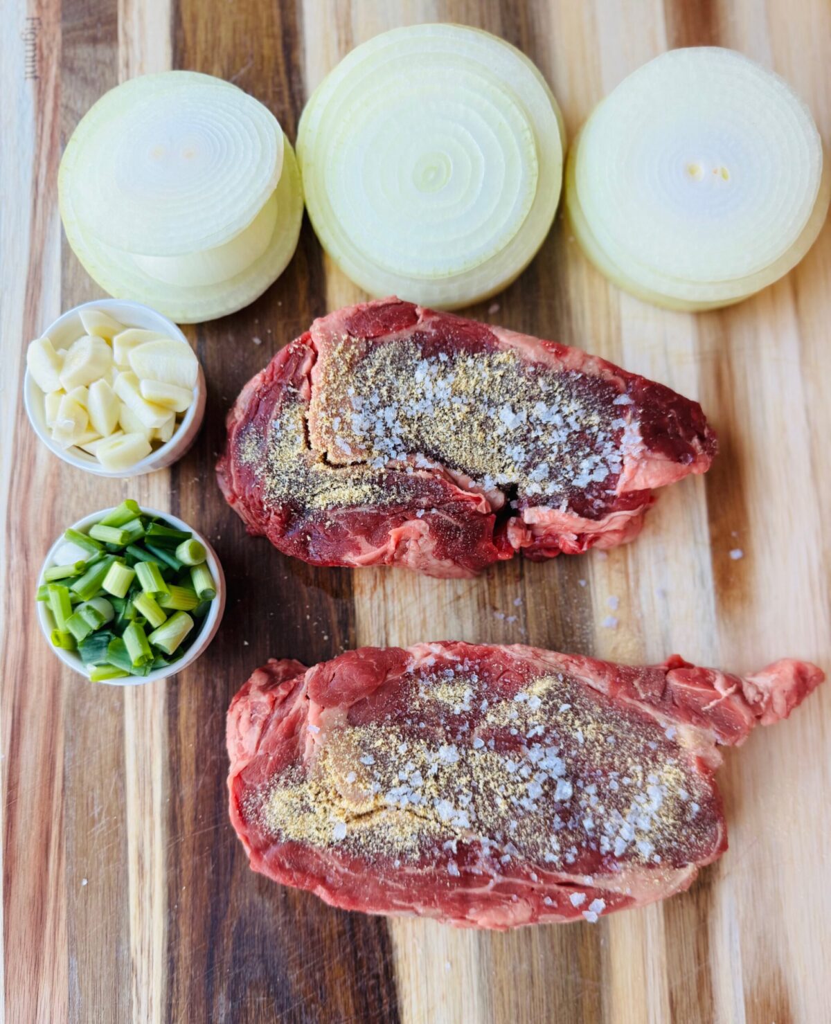 Smothered Ribeye Steak with Mushrooms, Onions, and Garlic