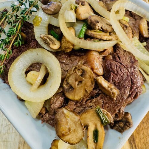 Smothered Grass-Fed Ribeye Steak with Veggies