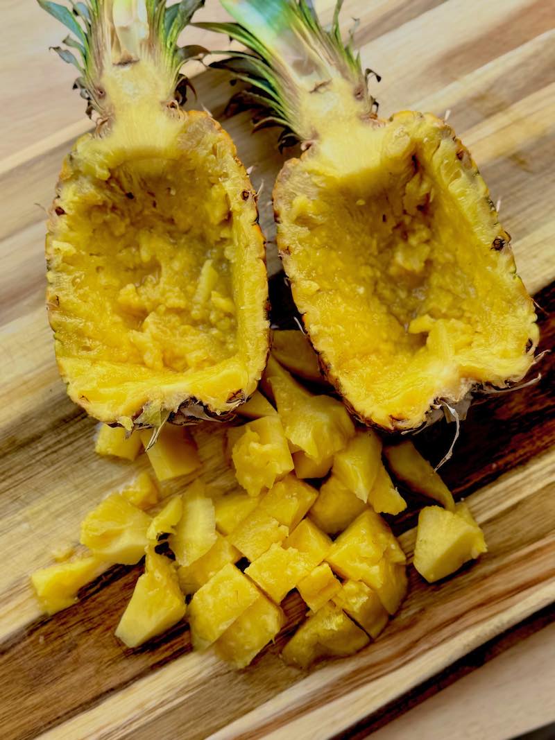 cut pineapple on cutting board