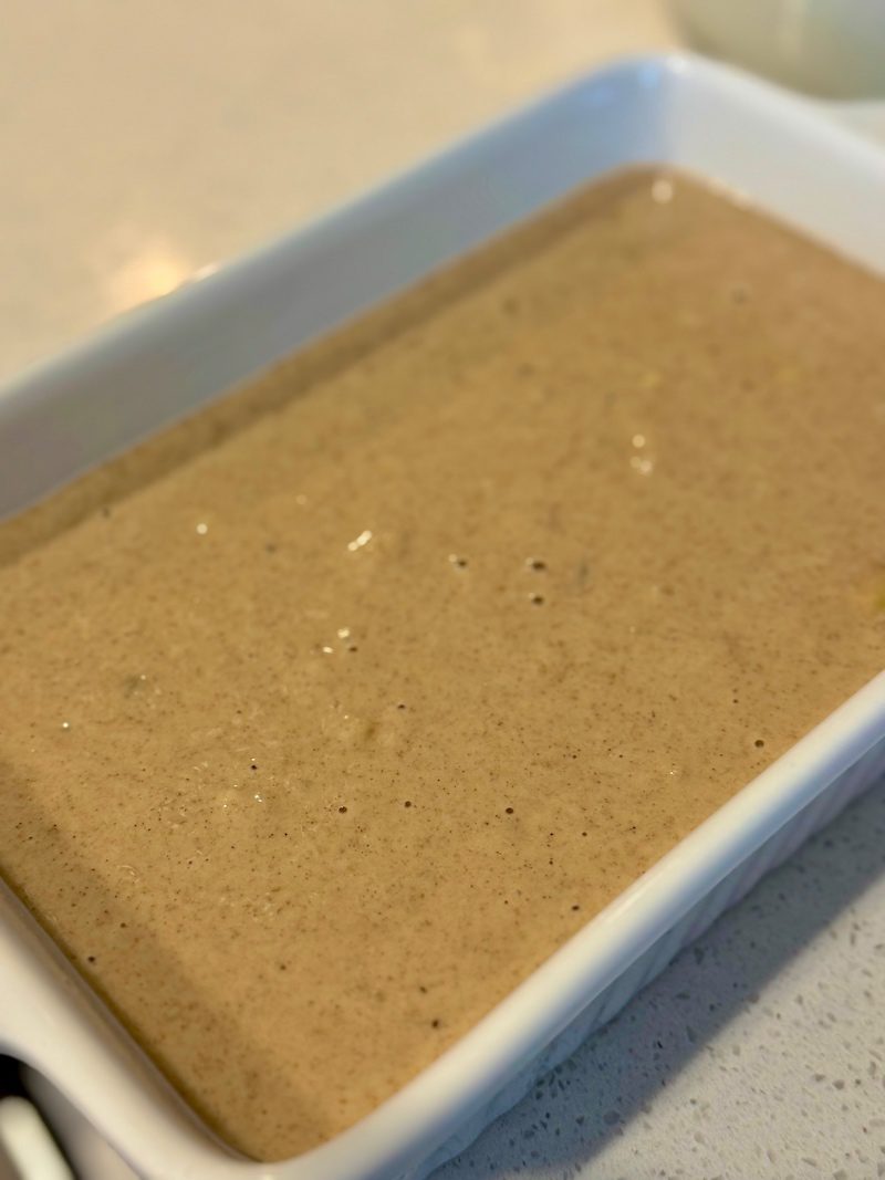 gluten free sourdough bread recipe batter, in white loaf pan